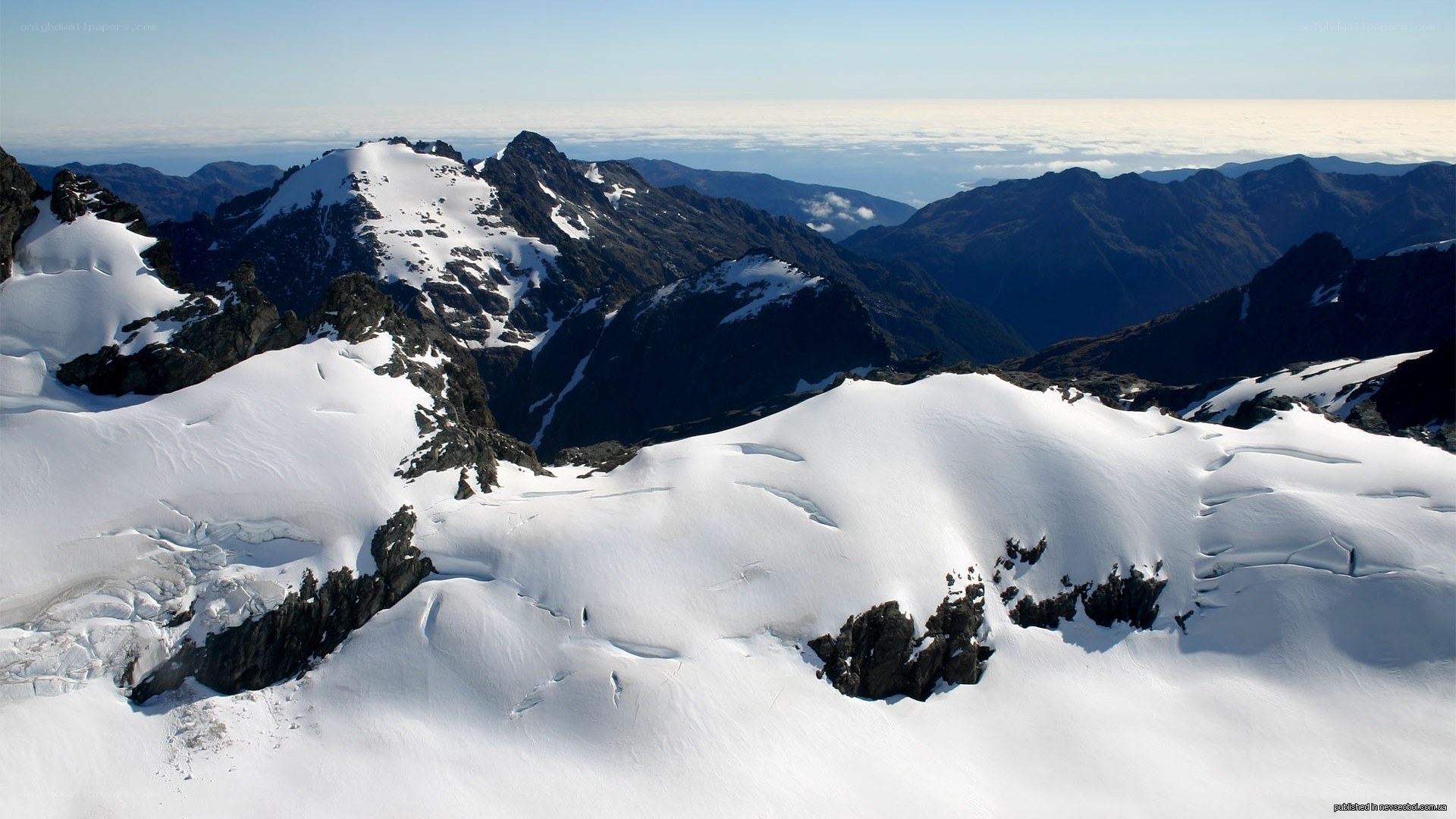 snow-covered mountain peaks