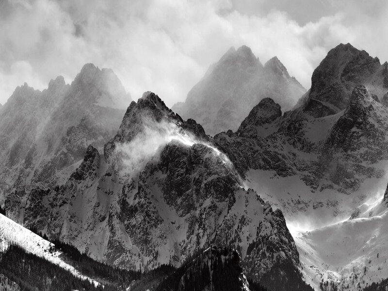 Snow-covered Mountain Peaks — Black, Dramatic, Winter, Photograph, Clouds, Forests, Rocky Slopes