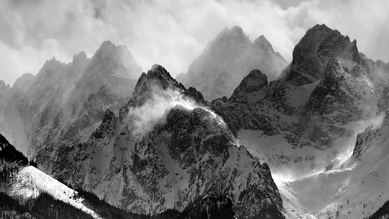 Snow-covered Mountain Peaks — Black, Dramatic, Winter, Photograph, Clouds, Forests