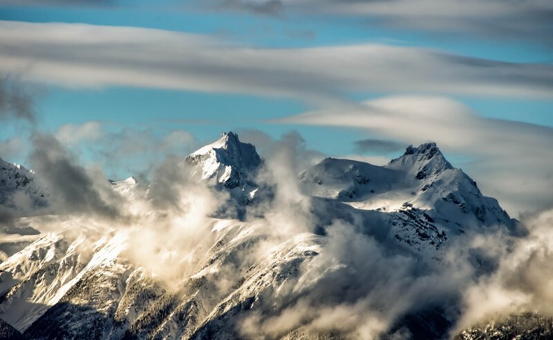 Snow-covered Mountain Peaks — Blue, Dramatic, Afternoon, Photograph, Clouds, Sky, Mountains