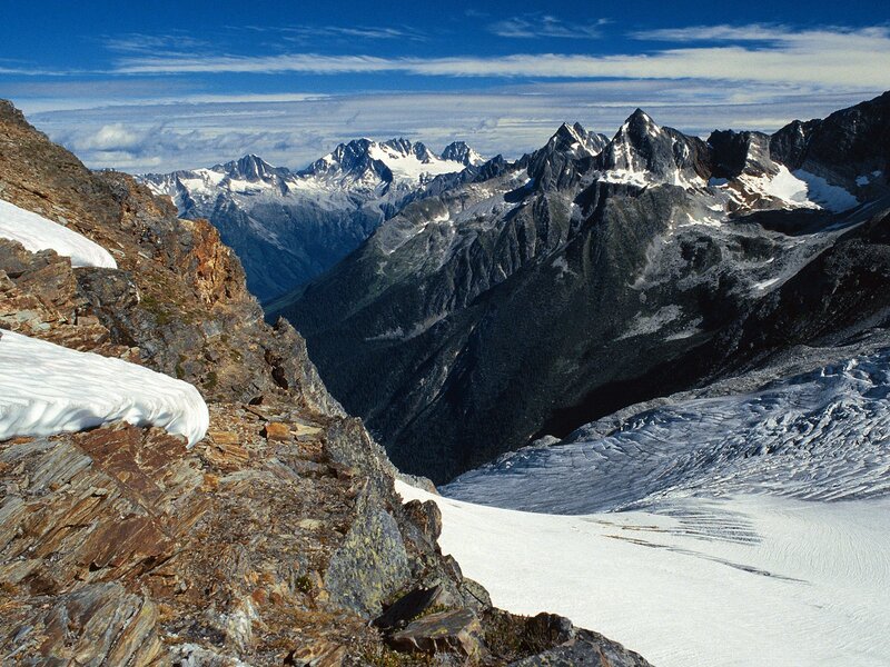 Snow-covered Mountain Peaks — Blue, Dramatic, Afternoon, Photograph, Mountains, Snow, Valley, Sky