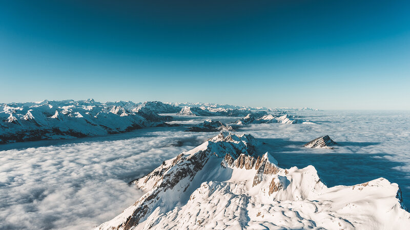 Snow-covered Mountain Peaks — Blue, Serene, Morning, Photograph, Clouds, Sky