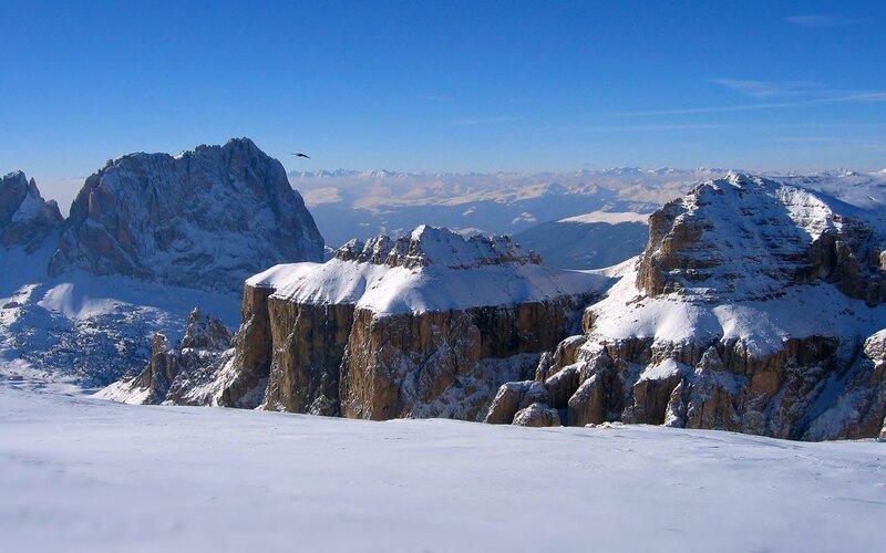 Snow-covered Mountain Peaks — Blue, Serene, Winter, Photograph, Mountains, Sky, Bird