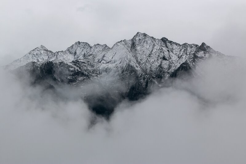 Snow-covered Mountain Peaks — Gray, Dramatic, Photograph, Clouds, Mountains, Snow