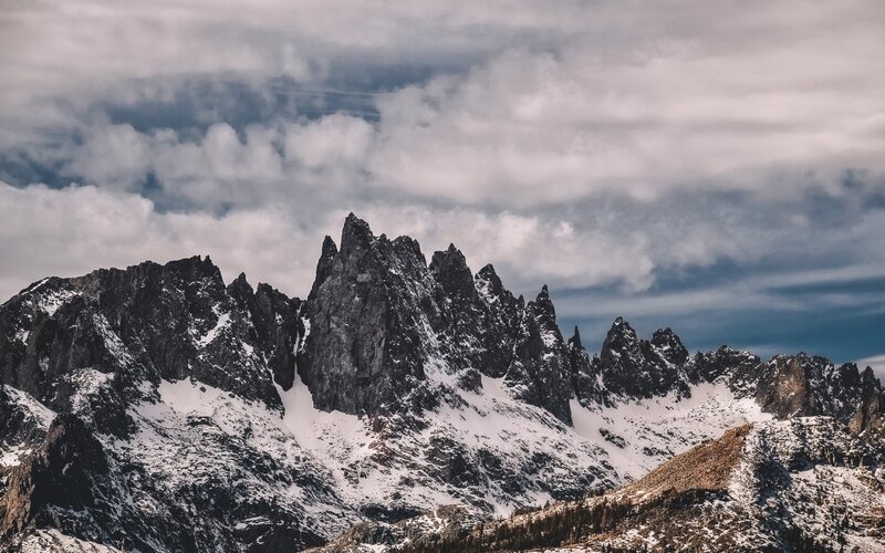 Snow-covered Mountain Peaks — Gray, Dramatic, Winter, Photograph, Clouds