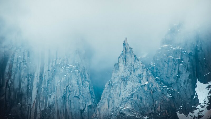 Snow-covered Mountain Peaks — Gray, Misty