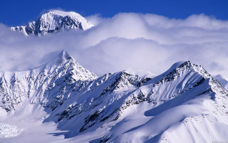 Snow-covered Mountain Peaks — Photograph, Sky