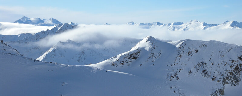 Snow-covered Mountain Peaks — Rocks