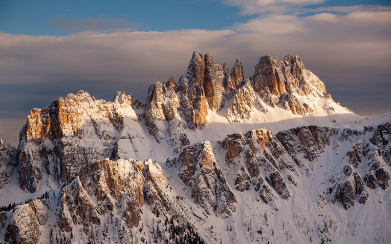 Snow-covered Mountain Peaks — White, Dramatic, Sunrise