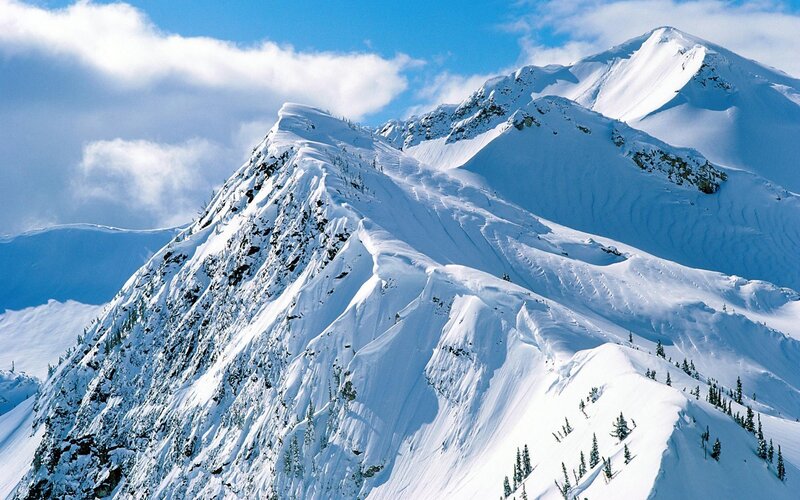 Snow-covered Mountain Peaks — White, Serene, Winter, Photograph, Clouds, Trees