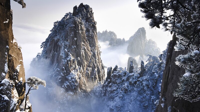 Snow-covered Mountain Peaks — White, Serene, Winter, Photograph, Trees, Clouds, Rocks, Snow