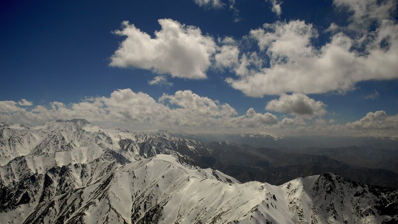 Snow-covered Mountain Range — Blue, Dramatic, Afternoon, Photograph, Mountains, Clouds