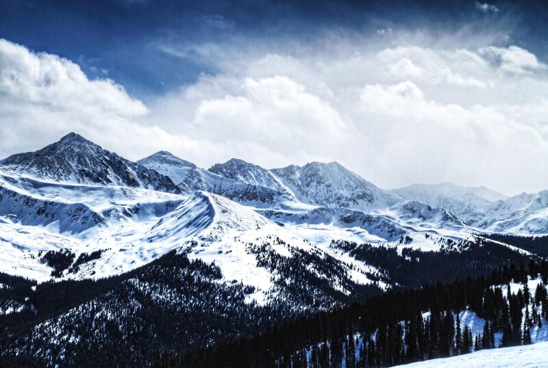 Snow-covered Mountain Range — Blue, Dramatic, Winter, Photograph, Clouds, Trees