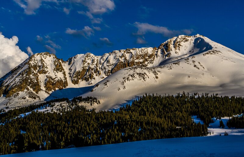 Snow-covered Mountain Range — Blue, Dramatic, Winter, Photograph, Forest, Clouds