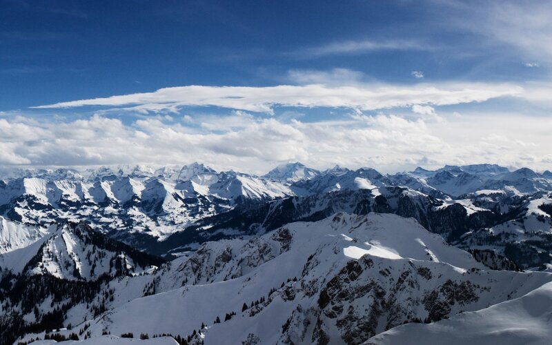 Snow-covered Mountain Range — Blue, Serene, Winter, Photograph, Mountains, Clouds, Trees