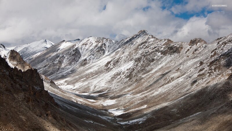 Snow-covered Mountain Range — Brown