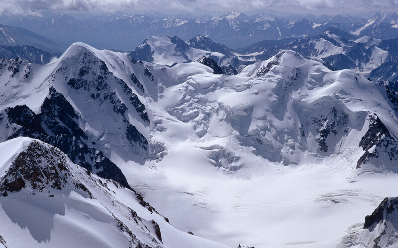Snow-covered Mountain Range — Dramatic