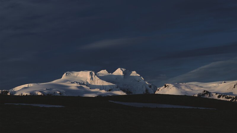 Snow-covered Mountain Range — White, Dramatic, Night