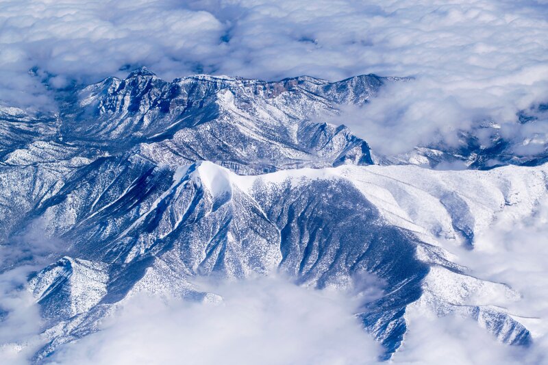 Snow-covered Mountain Range — White, Dramatic, Winter, Photograph, Clouds, Mountains