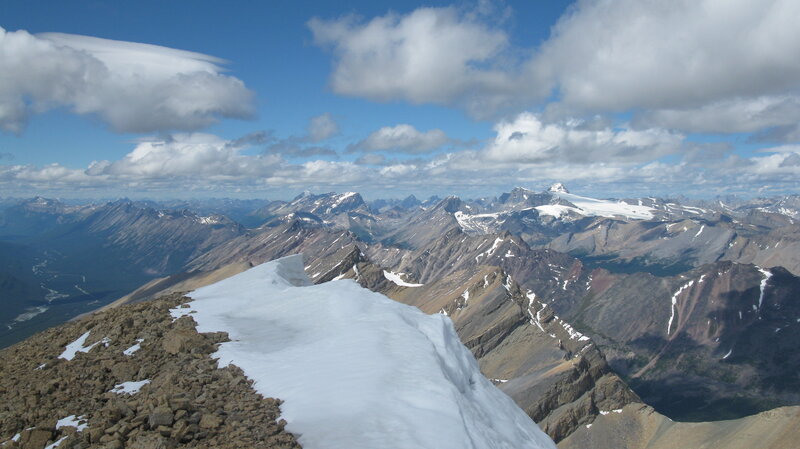 Snow-covered Mountain Ridge — Blue, Serene, Afternoon