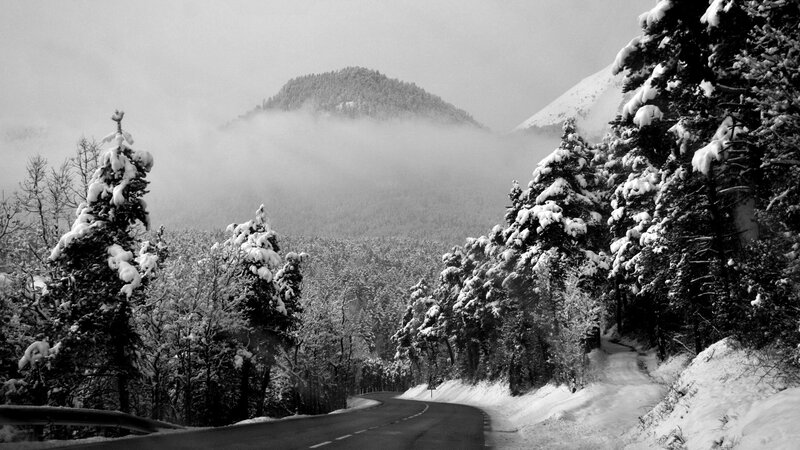 Snow-covered Mountain Road — Black, Serene