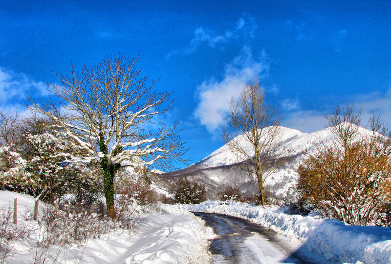 Snow-covered Mountain Road — Blue