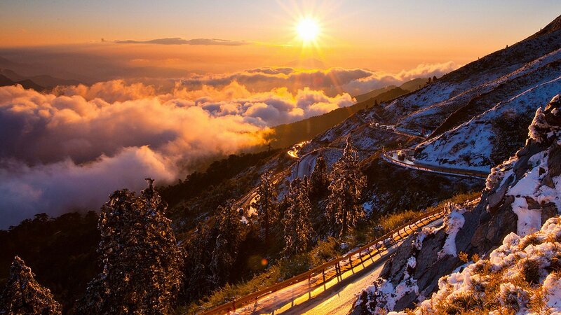 Snow-covered Mountain Road — Orange