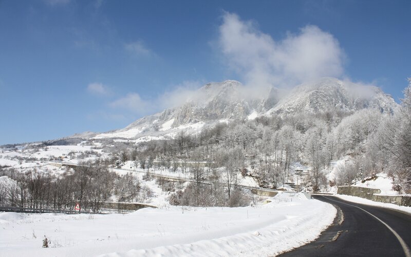 Snow-covered Mountain Road