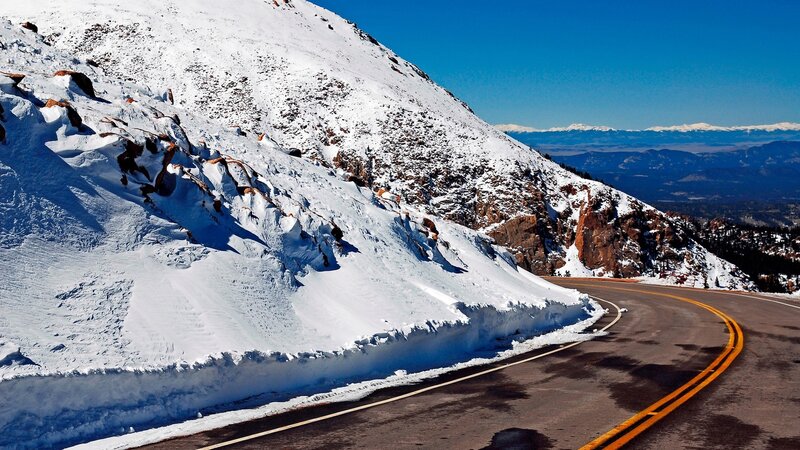 Snow-covered Mountain Road — White, Serene