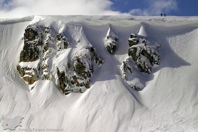 Snow-covered Mountain Rocks