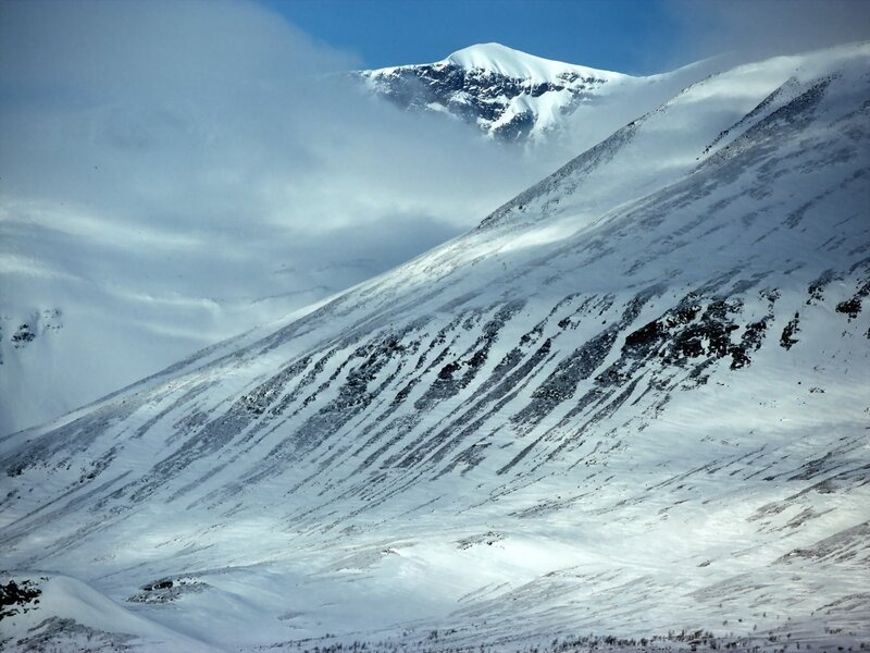 Snow-covered Mountain Slope — White, Dramatic, Winter