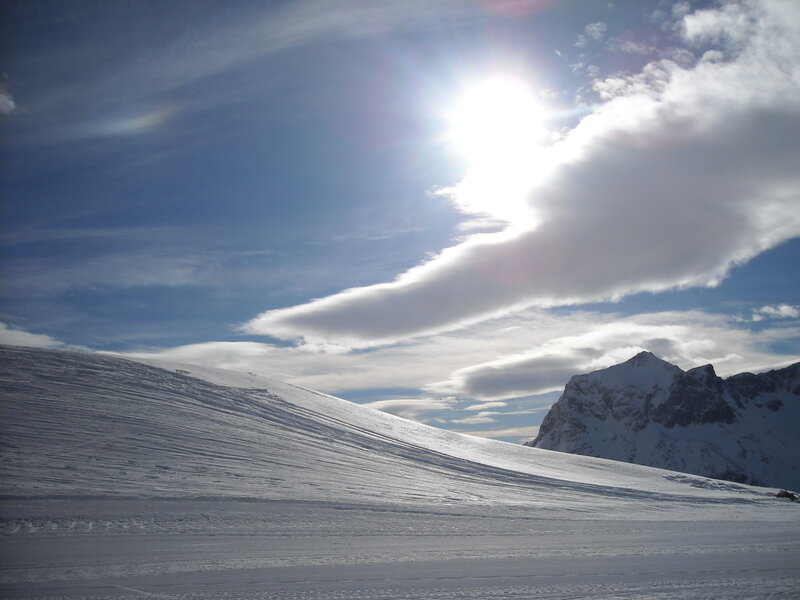 Snow-covered Mountain Slope — White, Serene, Afternoon, Photograph, Clouds