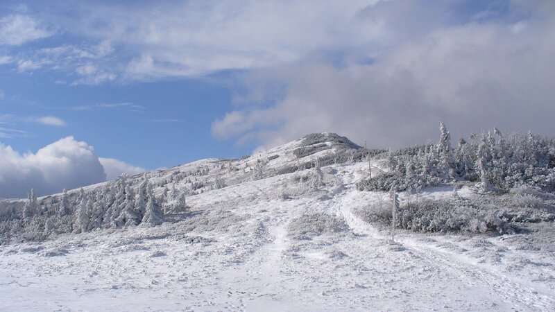 Snow-covered Mountain Slope — White, Serene, Winter, Photograph, Trees, Clouds, Path