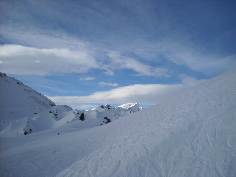 Snow-covered Mountain Slopes — White, Serene, Winter