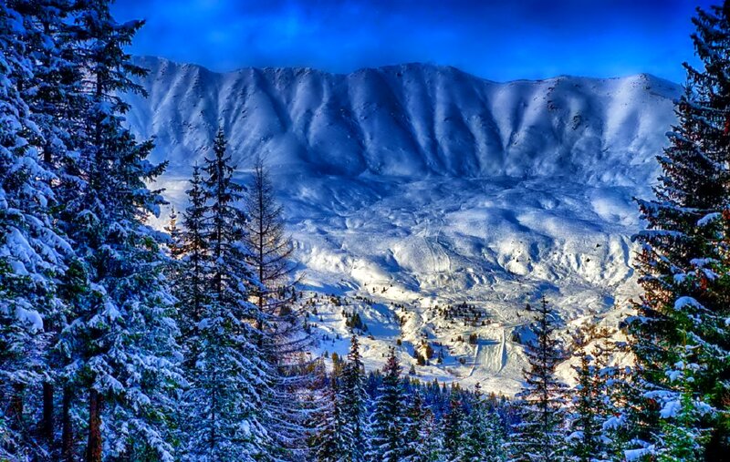 Snow-covered Mountain Valley — Blue, Serene, Winter, Photograph, Evergreen Trees