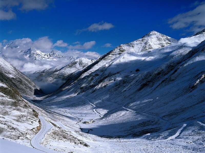 Snow-covered Mountain Valley — Blue, Serene, Winter, Photograph, Mountains, Road, Clouds, White, Gray