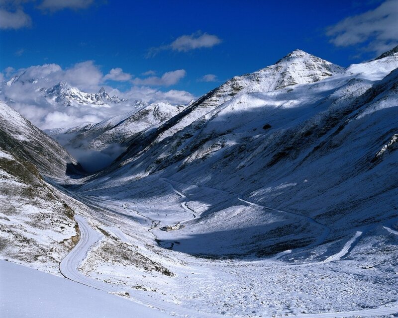Snow-covered Mountain Valley — Blue, Serene, Winter, Photograph, Mountains, Road, Clouds, White
