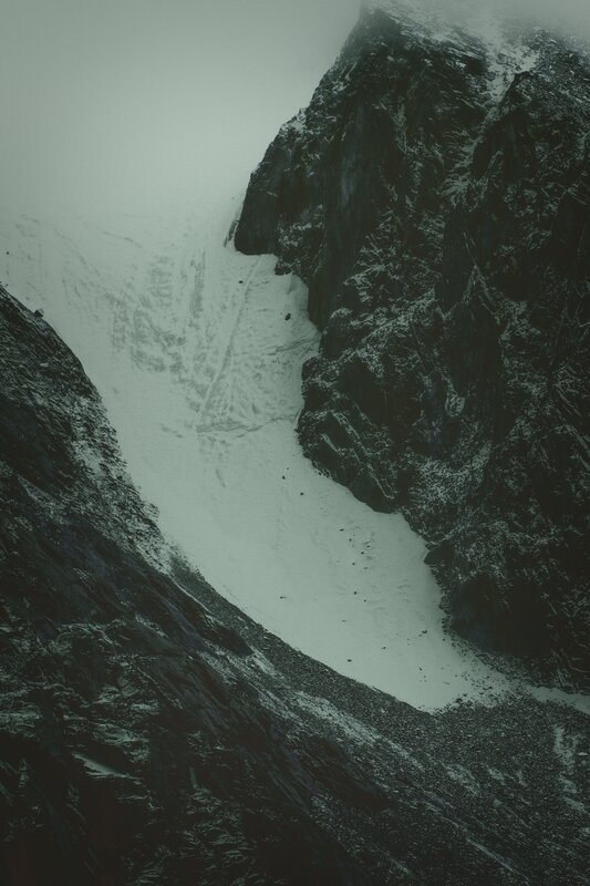 Snow-covered Mountain Valley — Gray, Dramatic
