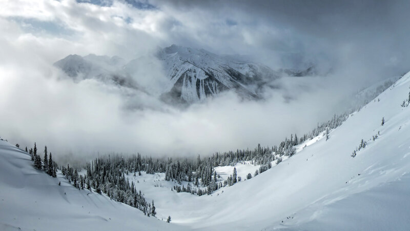 Snow-covered Mountain Valley — White, Dramatic, Winter, Photograph, Clouds
