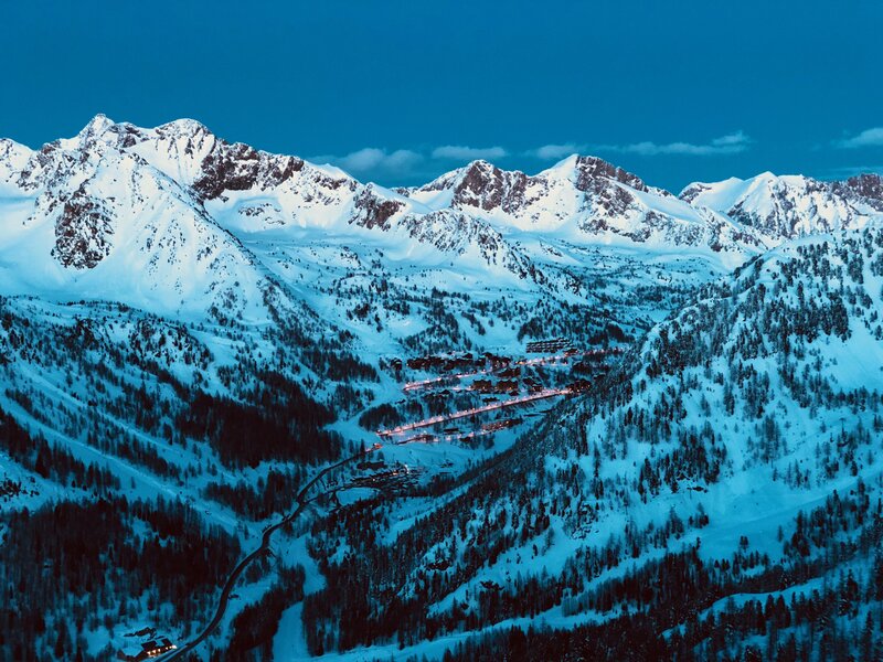 Snow-covered Mountain Village — Blue, Serene, Night, Photograph, Mountains, Trees