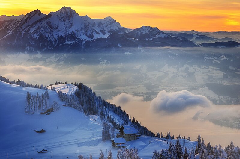 Snow-covered Mountain Village — Orange, Serene, Sunrise, Photograph