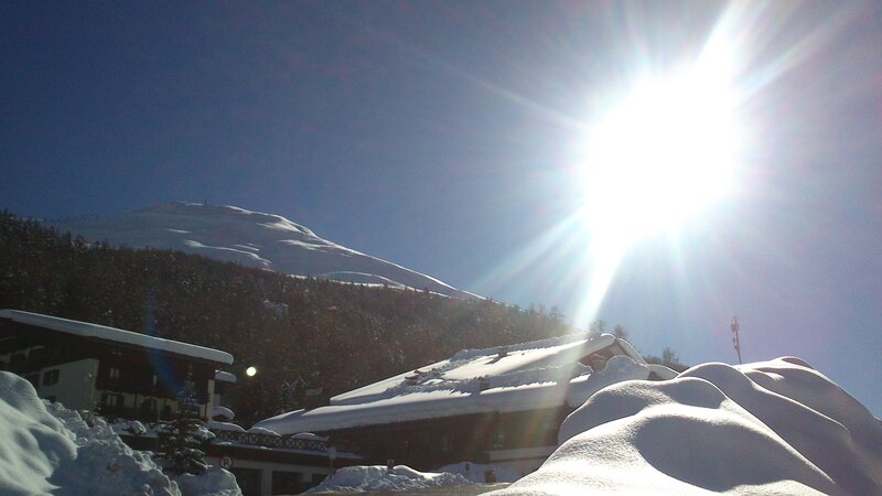 Snow-covered Mountain Village — White, Bright