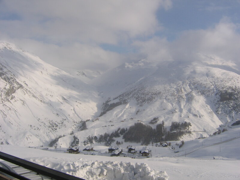 Snow-covered Mountain Village — White, Serene