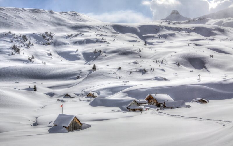 Snow-covered Mountain Village — White, Serene, Winter, Photograph, Huts