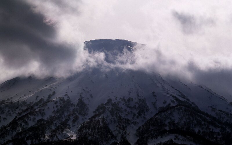 Snow-covered Mountain — White, Dramatic, Winter, Photograph, Clouds, Trees