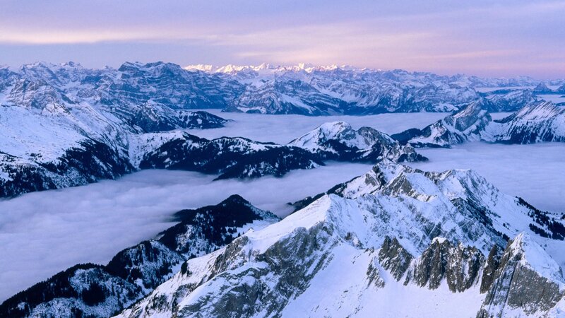 snow-covered mountains at dawn