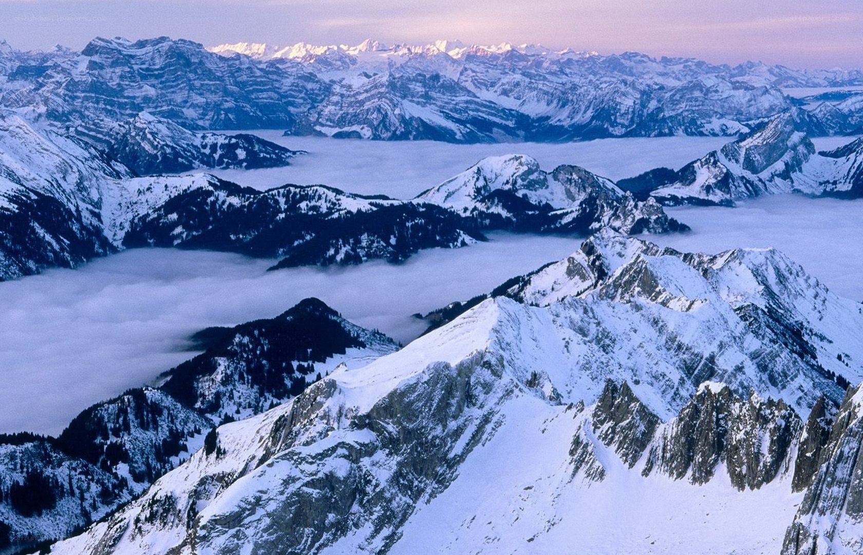 snow-covered mountains at dawn