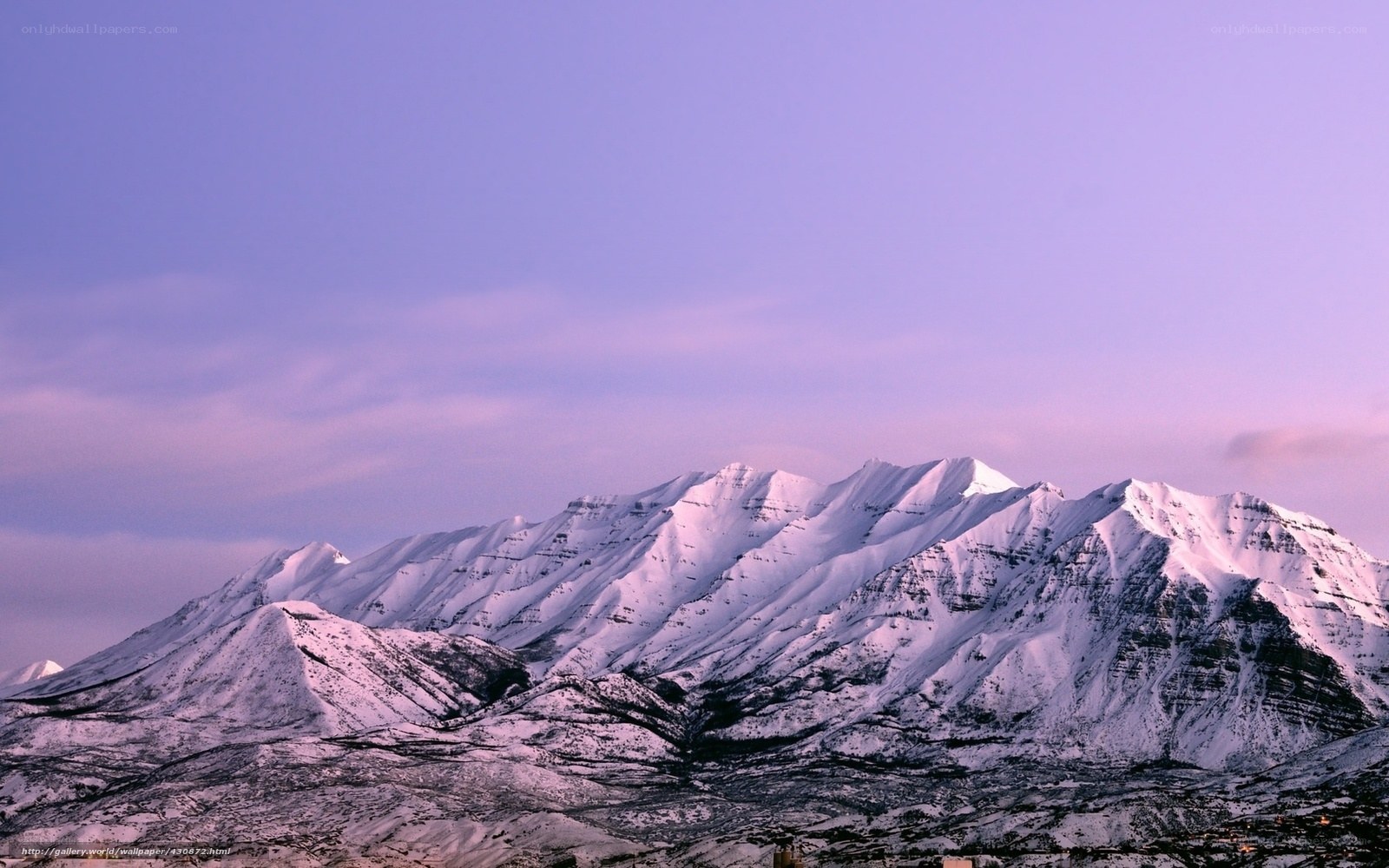 snow-covered mountains at dusk