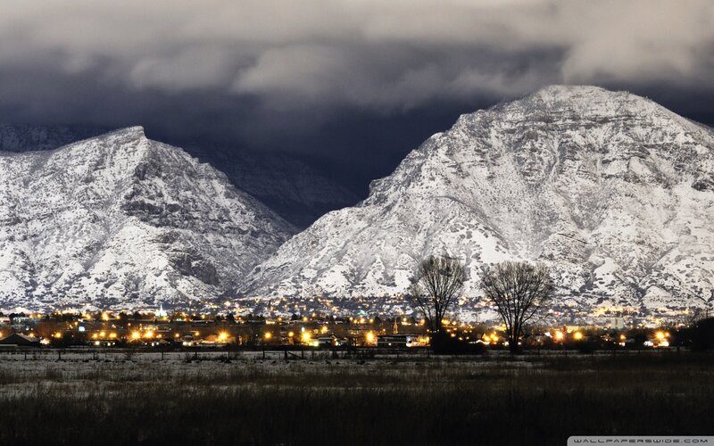 Snow-covered Mountains at Night — White