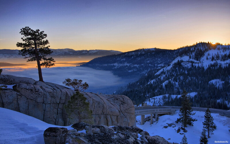 Snow-covered Mountains at Sunrise